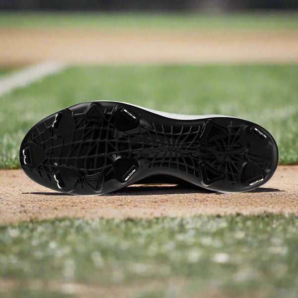 View of the sole of the Mizuno Pro FP Low Women’s Metal Softball Cleat