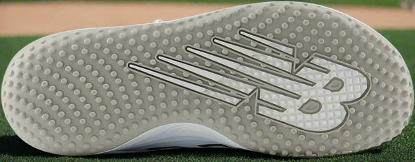 Sole of the New Balance Fresh Foam Velo v4 Women's Turf-Trainer Shoe - White