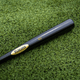 Close-up of the barrel on the Baum Bat Standard Gold Stock Maple Baseball Bat