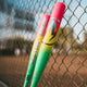 2026 Easton Hype Fire® USA Baseball Bats leaning on a fence