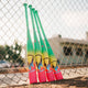 2026 Easton Hype Fire® USA Baseball Bats resting against a fence
