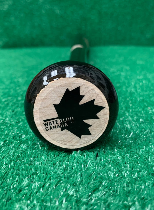 Knob and logo of the Märk Lumber Company Pro Limited Series ML-110 Wood Baseball Bat
