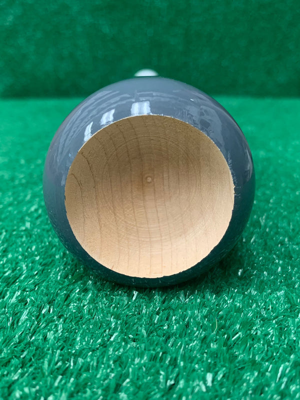 Cupped end of the Märk Lumber Company Pro Limited Series BQ1 Wood Baseball Bat