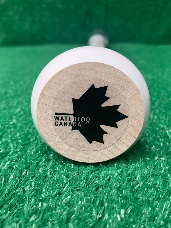 Knob and logo of the Märk Lumber Company Pro Limited Series BQ1 Wood Baseball Bat
