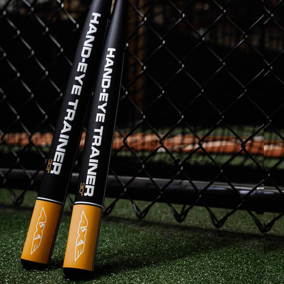 Axe™ Hand-Eye Trainer Bats leaning on the fence