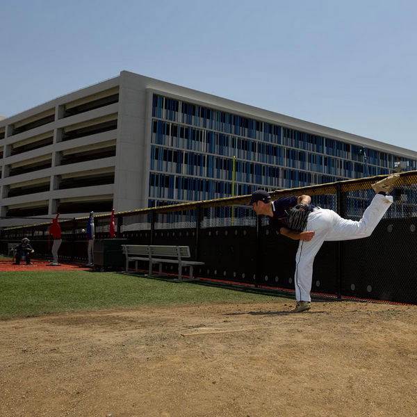 Pitcher in the bullpen using the Designated Hitter® Pro-Pitching Dummy & Training Aid
