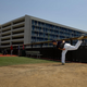 Pitcher in the bullpen using the Designated Hitter® Pro-Pitching Dummy & Training Aid