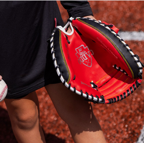Young player wearing the Marucci Caddo Series 31" Baseball Catchers Mitt