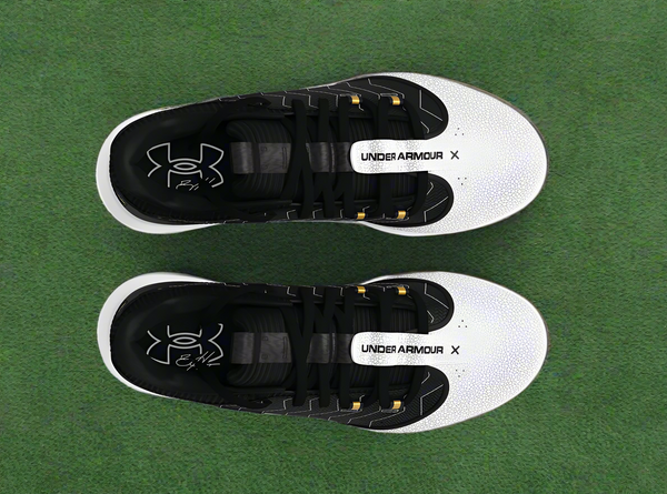 Top view of the Under Armour Youth Harper 9 TPU Jr. Baseball Cleats