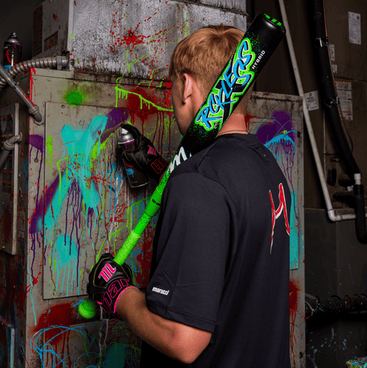 Player holding the 2026 Marucci CATX RCKLESS Hybrid -8 Senior League USSSA Big Barrel Baseball Bat