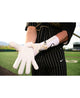 Player wearing the Evoshield Carbyne Adult Batting Glove with Strap - White