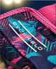 Close-up of the logo on the Evoshield X-SRZ™ Miami Vice Sliding Mitt 2.0