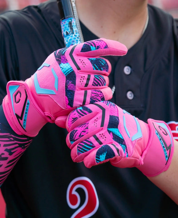 Player batting with the Evoshield Adult X-SRZ™ Miami Vice Carbyne Batting Glove - Black/Hot Pink