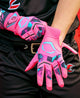 Player putting on the Evoshield Adult X-SRZ™ Miami Vice Carbyne Batting Glove - Black/Hot Pink