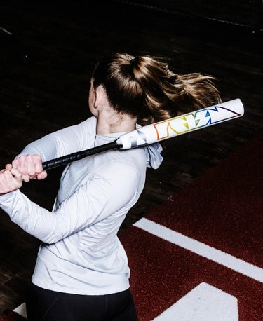 Player swinging the 2025 DeMarini Prism Plus+ -10 Fastpitch Bat