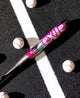 2026 DeMarini Exile™ Cyborg -3 BBCOR Baseball Bat laying on the ground by some baseballs