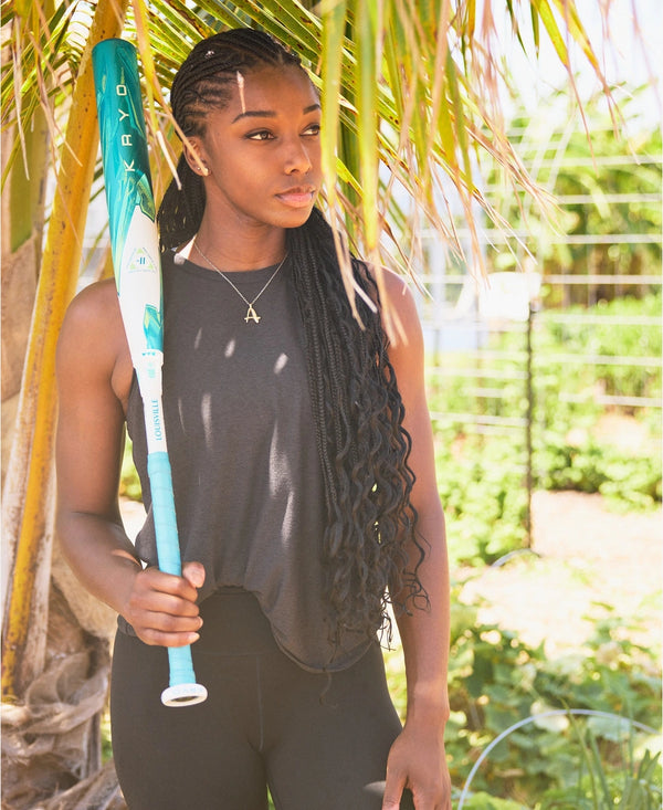 Player holding the 2026 Louisville Slugger KRYO Fastpitch Bat