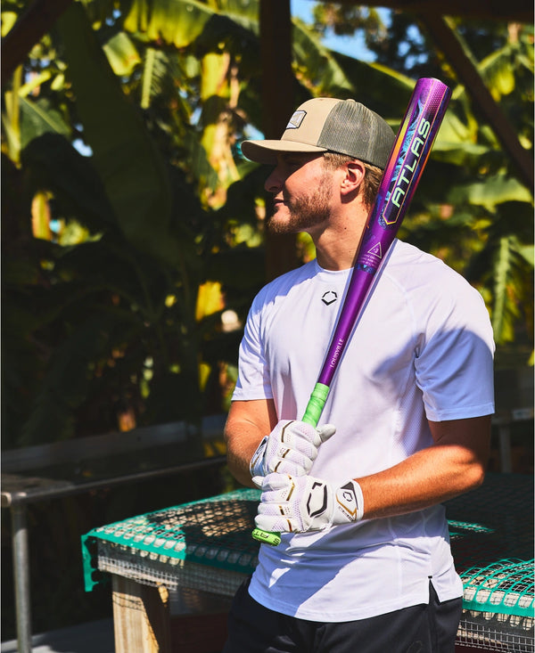 Player holding the 2025 Louisville Slugger Atlas™ Neon Energy -3 BBCOR Baseball Bat