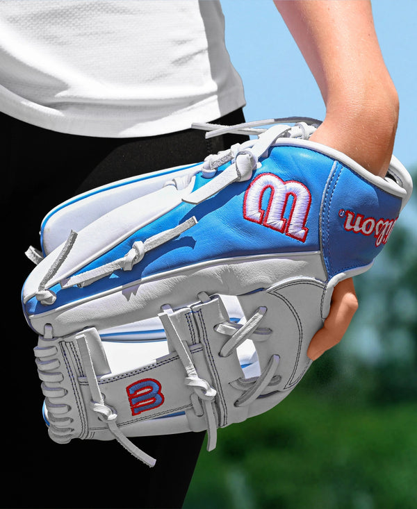 Player wearing the Wilson A1000® H12 12" Fastpitch Glove in the field