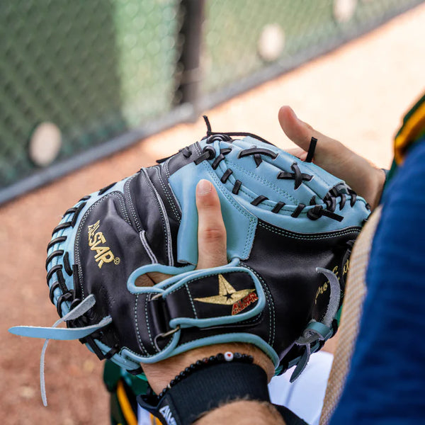 Side view of a player wearing the All Star Limited Pro Elite® Series 34" Baseball Catchers Mitt