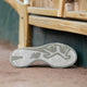 View of the sole of the New Balance Youth Fresh Foam 3000 v7 Molded Cleat - White w/Black