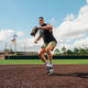 Player in the field wearing the New Balance Fresh Foam 3000 v7 Molded Cleat - Black w/ White