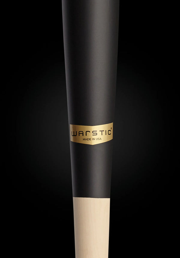 Close-up of the logo on the Warstic WS110 Pro Standard Issue Maple Baseball Bat