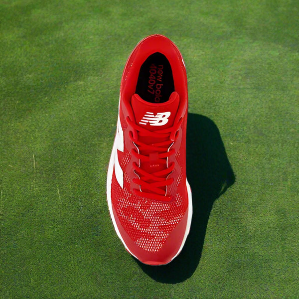 Top view of the New Balance Dynasoft 4040v7 Youth Turf Trainer - Red