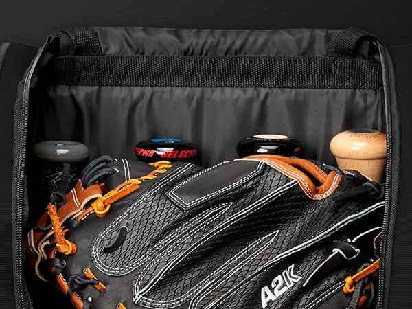 Close-up of the bat and glove compartment on the Evoshield Standout Wheeled Bag