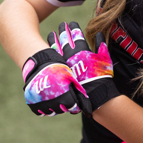 Player adjusting her Marucci Foxtrot Tee Ball Youth Batting Glove - Black/Pink