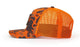 Side view of the Richardson Printed Five Panel Trucker Cap - Realtree