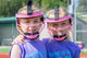 Two young players pose while wearing the Rip-It Play Ball Girls Softball Fielding Mask