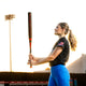 Player holding a 2024 Easton Ghost® Advanced -8 Fastpitch Bat