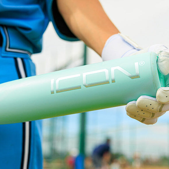 Close-up of player showing the 2026 Rawlings ICON™ USA Baseball Bat