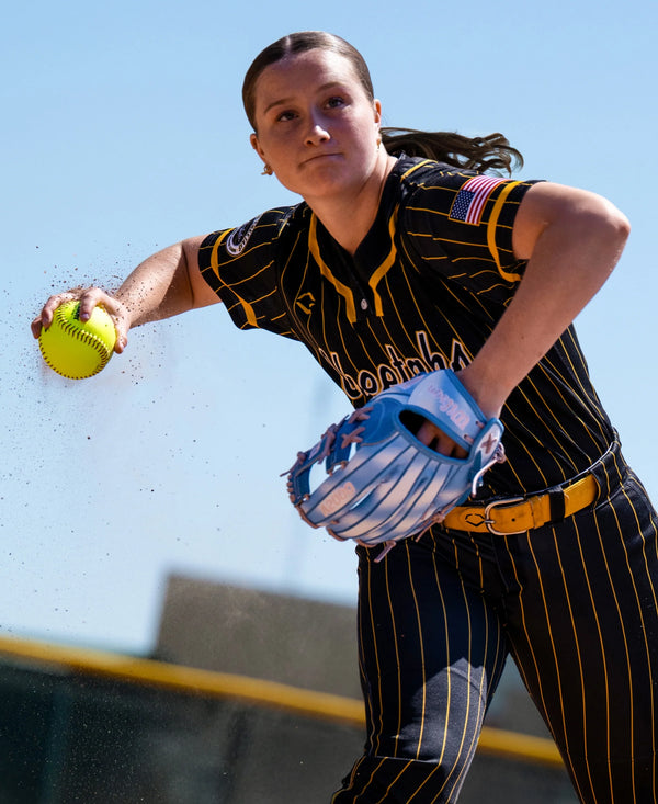 Player in action on the field with the Wilson 2027 A2000® H12SS 12" Fastpitch Glove