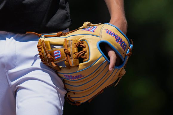 Player in the field wearing the Wilson 2027 A1000® 1786 11.5" Baseball Glove