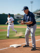 Coach using the Ultrak 435 Pitch Counter with Strike Pct./Pitch Speed Monitor - 10 Memory Stopwatch