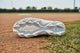 View of the sole on the Under Armour Girls Glyde Sola RM Jr. Fastpitch Molded Cleat - Columbia