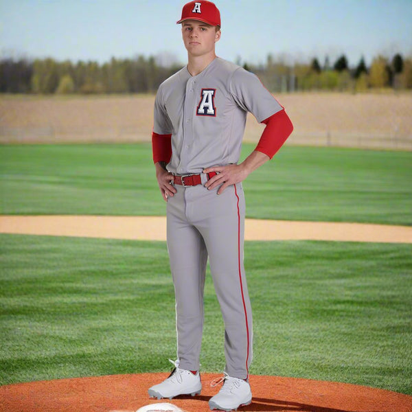 Player modeling the Champro Triple Crown 2.0 Tapered Baseball Pants w/ Braid