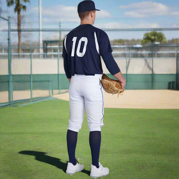 Player modeling the Champro Triple Crown 2.0 Knicker Baseball Pants w/ Braid