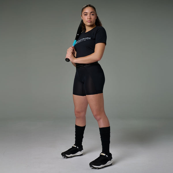 Player modeling the Champro Women's Take-Out Fastpitch Sliding Short 