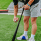Batter applying All Star Big Fly™ Bat Tack Spray to his bat