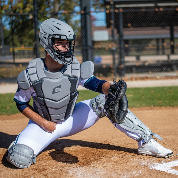 Player wearing the light gray Champro Optimus Champion Plus Baseball Catchers Kit in a game