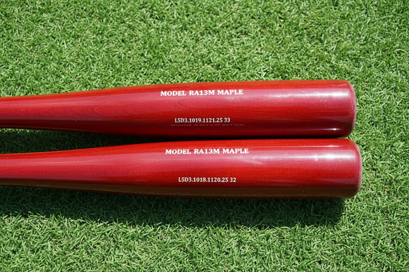 Close-up of the barrel on the  Chandler RA13M Maple Wood Bat - Cherry/Cherry