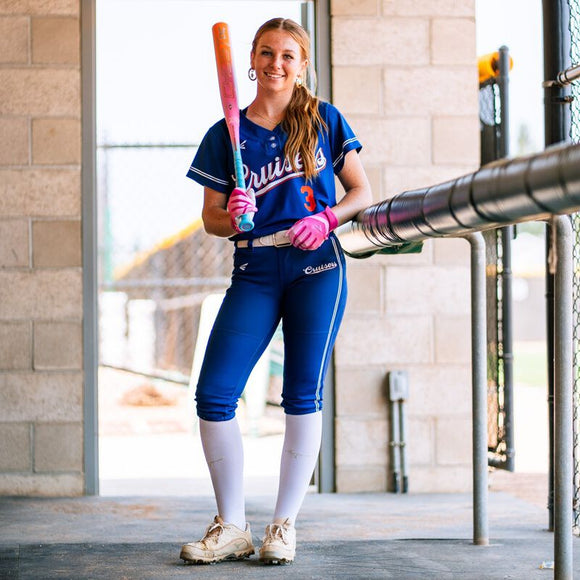 Player modeling the 2025 Easton Ghost OG Rainbow Sherbert Fastpitch Bat