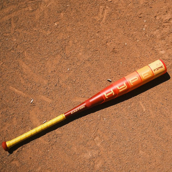 2025 Easton Hype Fire® USSSA Baseball Bat near the batter's box