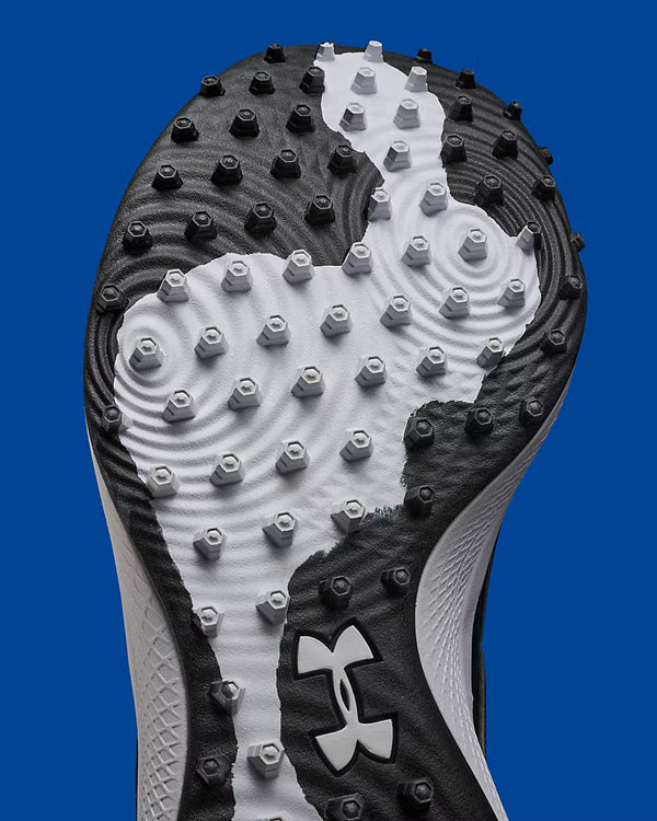 Close-up view of the outer sole on the Under Armour Men's Yard Icon Turf Baseball Shoe - Black/White