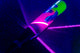 Close-up of the 2027 Easton Hype Fire USSSA Baseball Bat illuminated with neon lighting