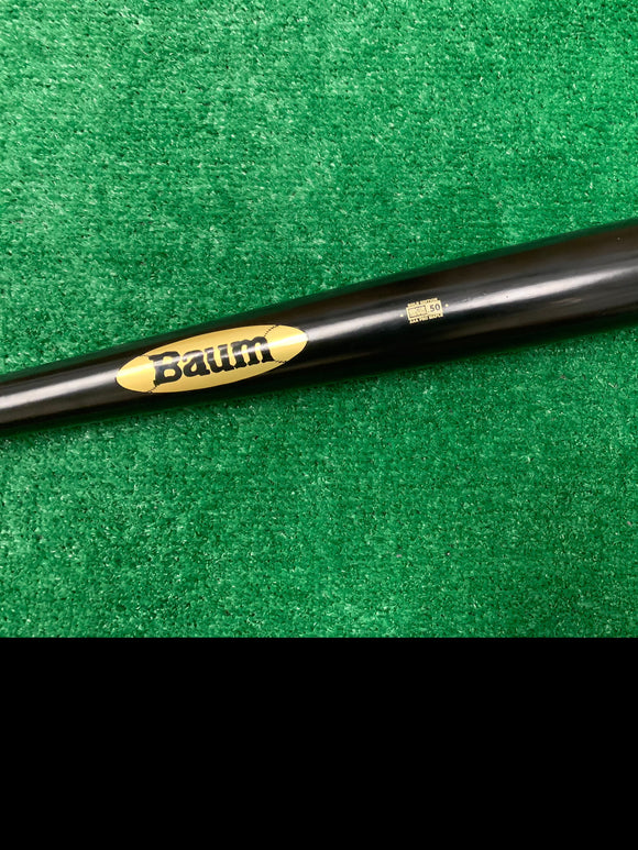 Close-up of the Baum Bat Standard Gold Stock Maple Baseball Bat
