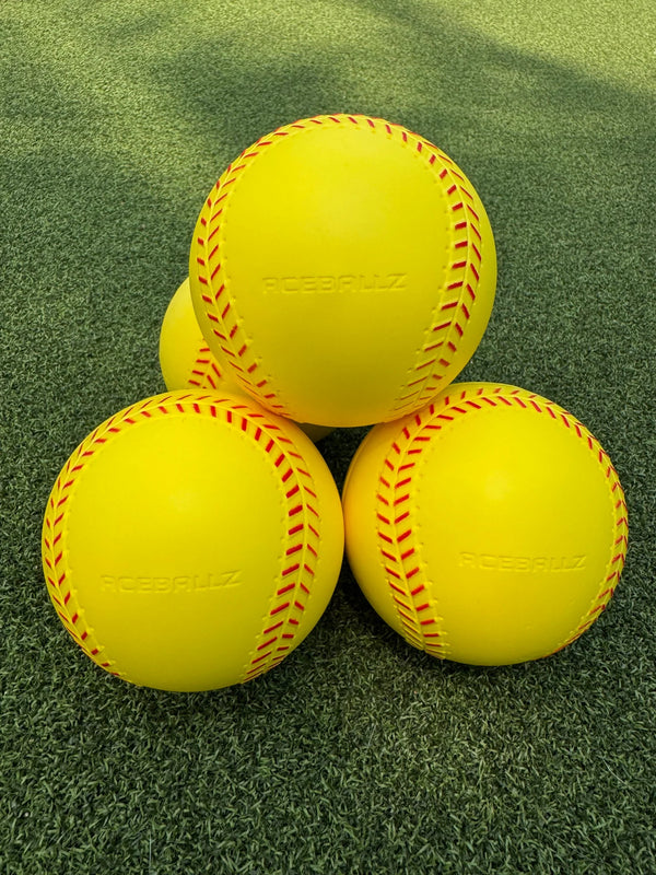 A stack of four Truflight Aceballz Pitching Machine Softballs